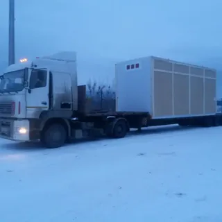 Перевозка крупногабаритного модульного блока на низкорамной платформе зимой