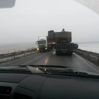Сопровождение негабаритной перевозки по зимней трассе