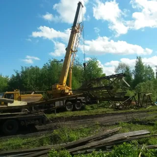 Погрузка крупной металлоконструкции автокраном на низкорамный трал