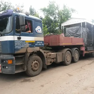 Тягач MAN с тралом для перевозки крупногабаритного груза ИТТ