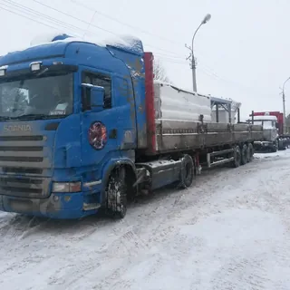 Перевозка металлической конструкции на длинномерном полуприцепе зимой